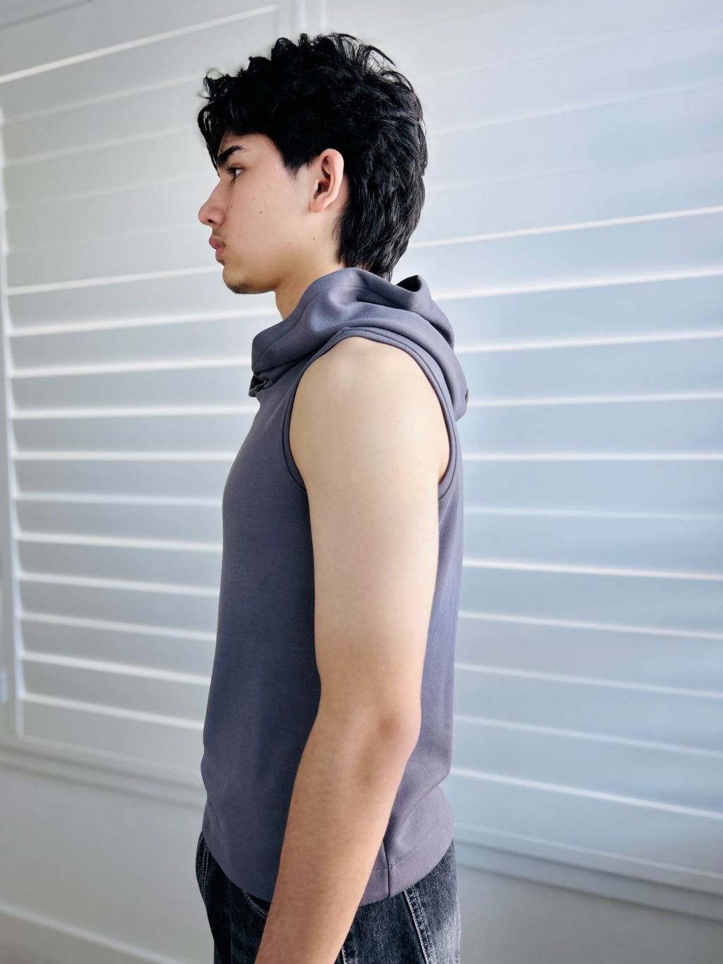 BIKINMOR Core Sleeveless Hoodie in Stone Grey side view with hood down
