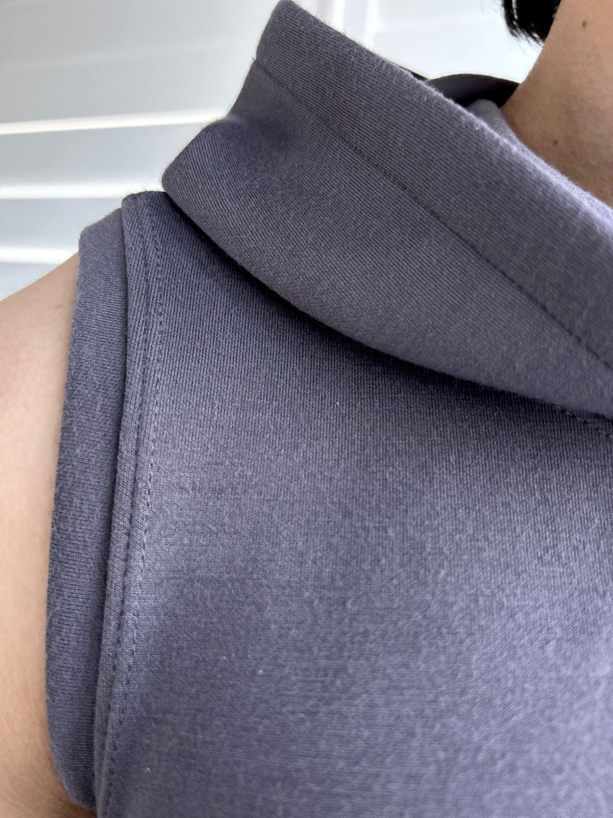 BIKINMOR Core Sleeveless Hoodie in Stone Grey fabric and armhole finish detail