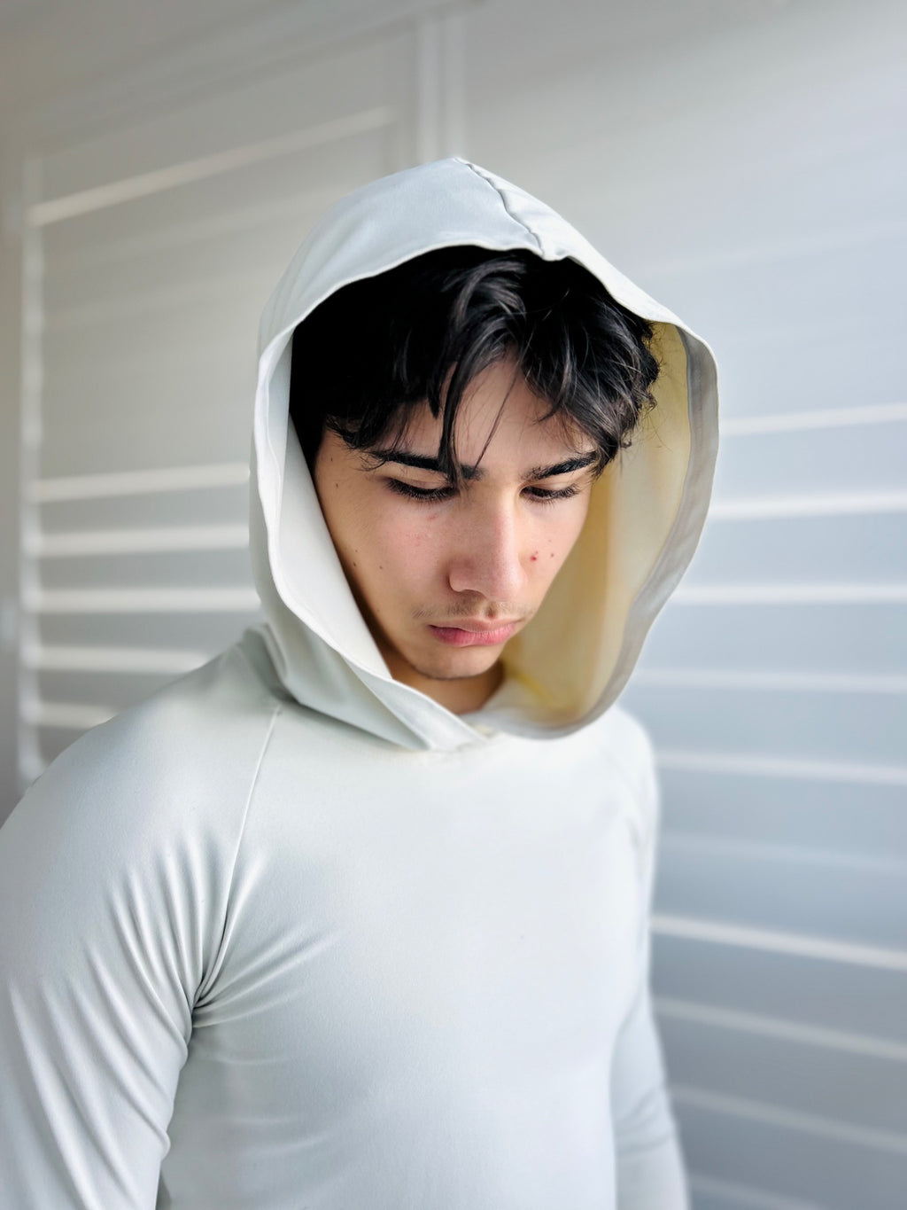 BIKINMOR Raglan Long Sleeve Hoodie in Recycled Reactivate Ivory — hood portrait