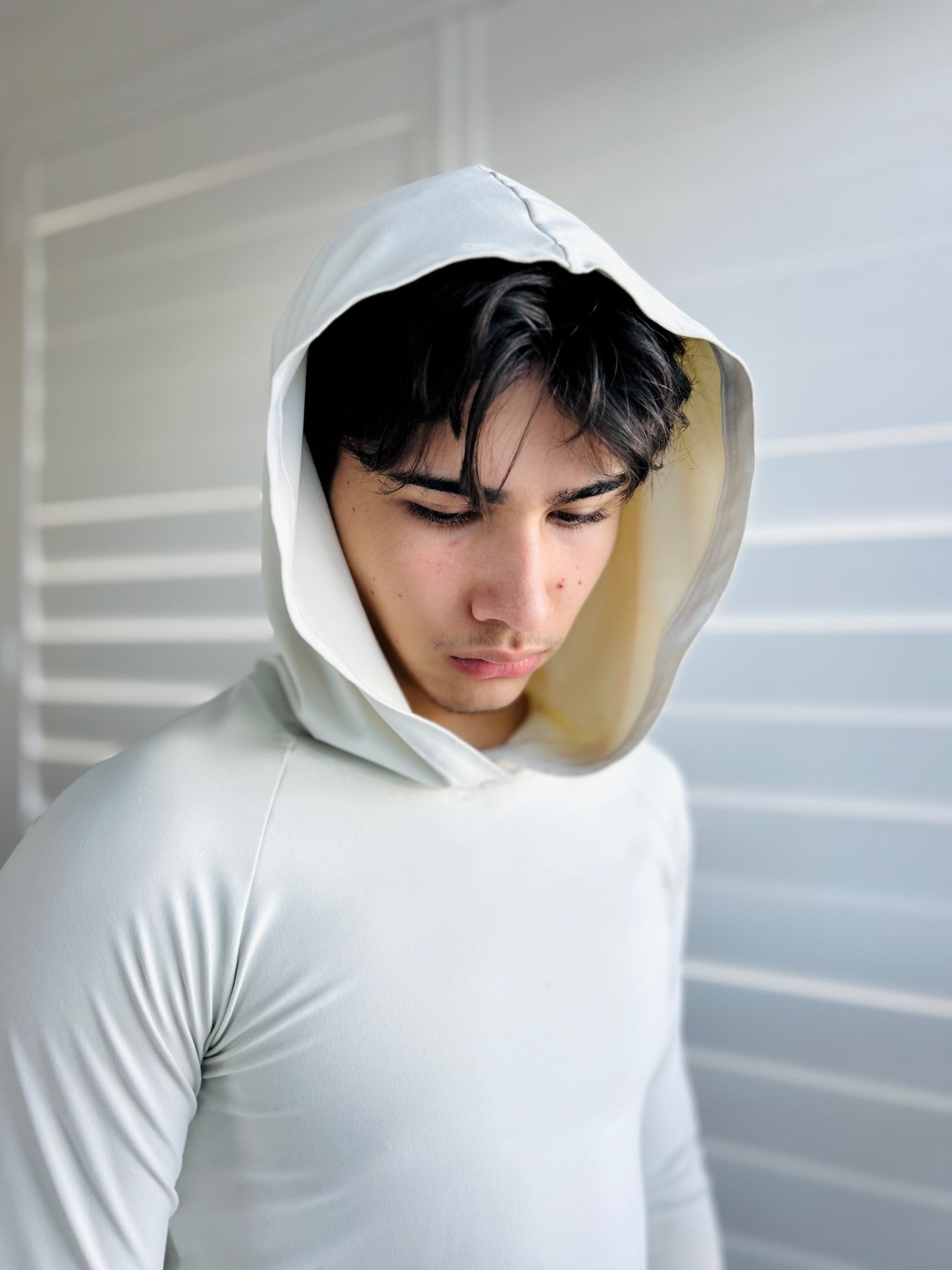 BIKINMOR Raglan Long Sleeve Hoodie in Recycled Reactivate Ivory — hood portrait