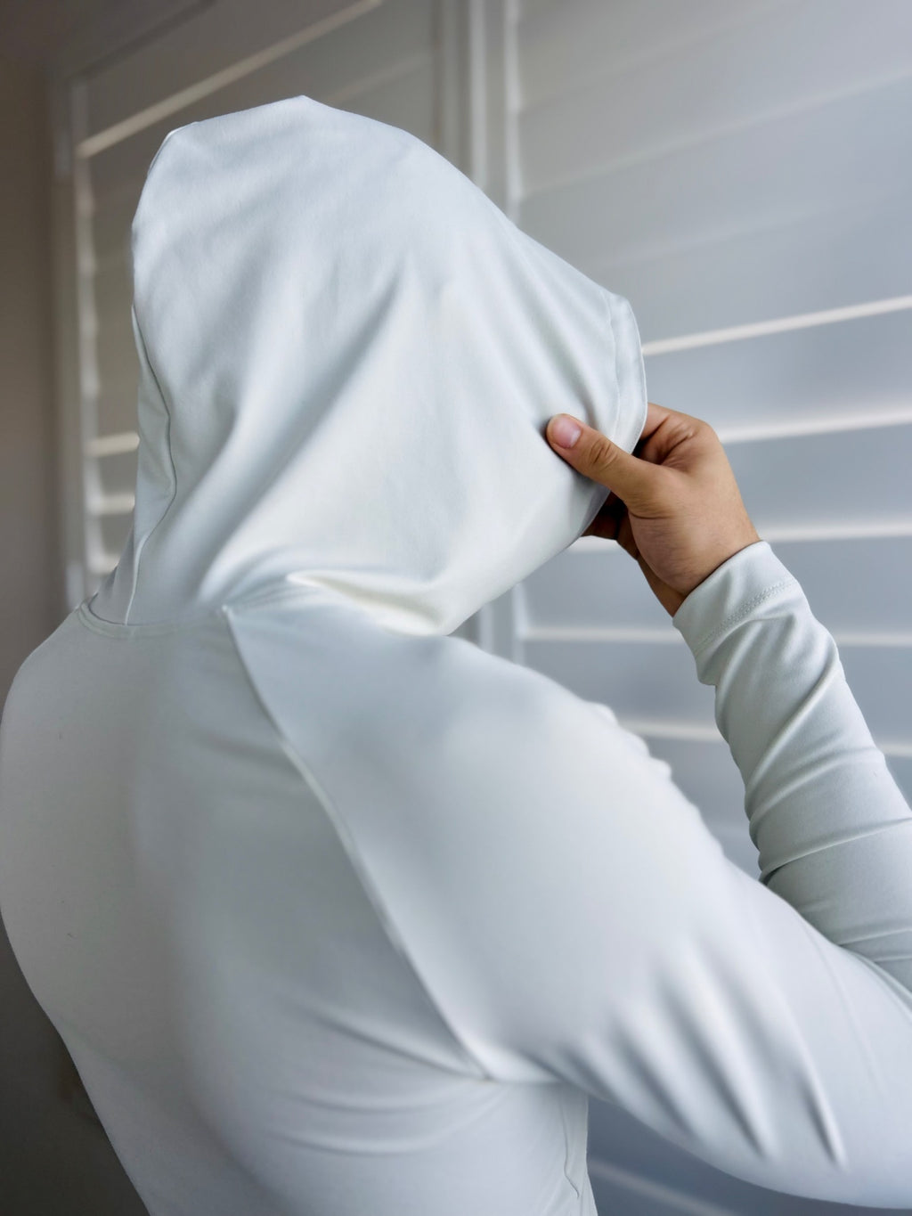 BIKINMOR Raglan Long Sleeve Hoodie in Recycled Reactivate Ivory — hood back detail