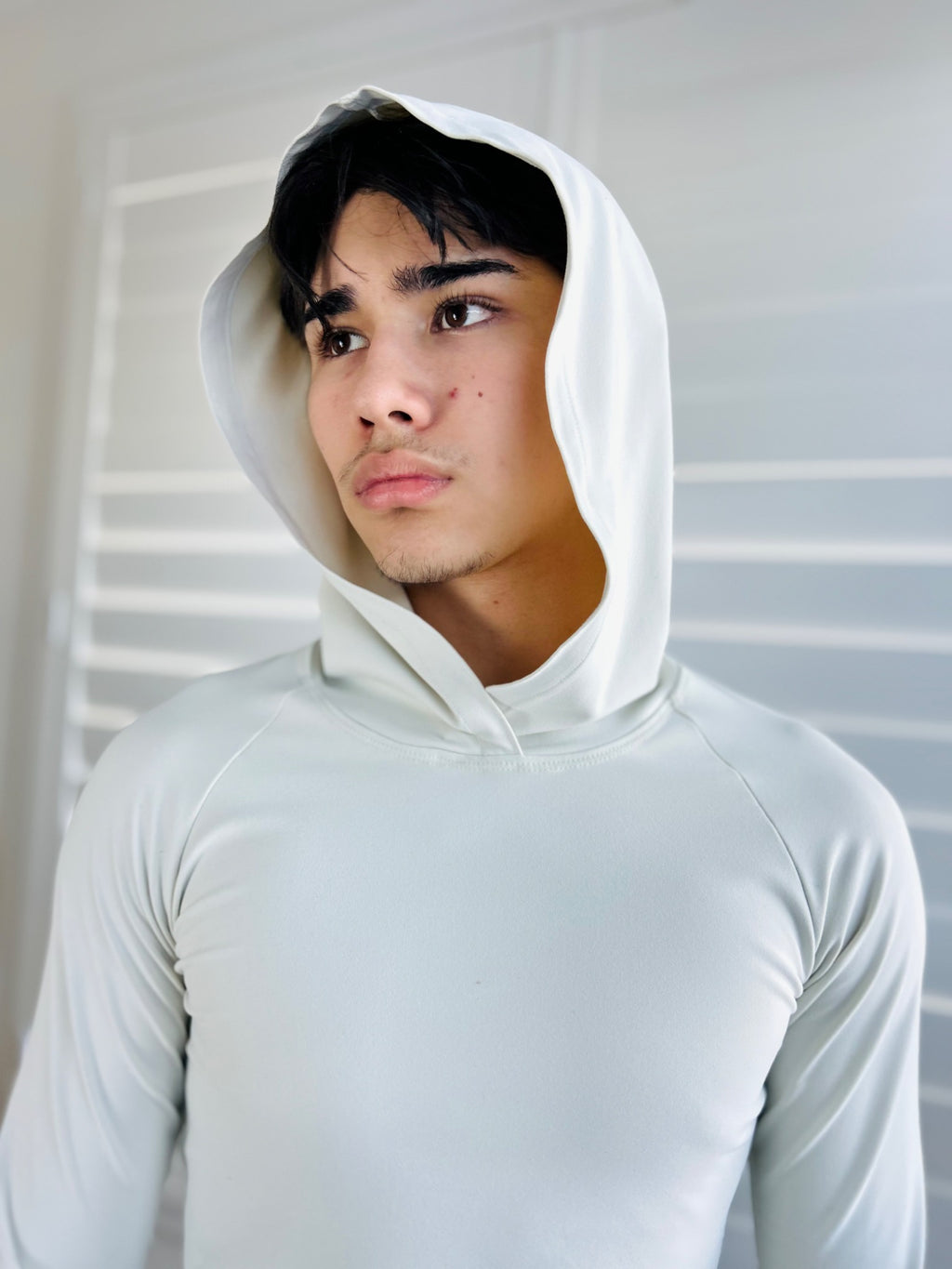 BIKINMOR Raglan Long Sleeve Hoodie in Recycled Reactivate Ivory — portrait view
