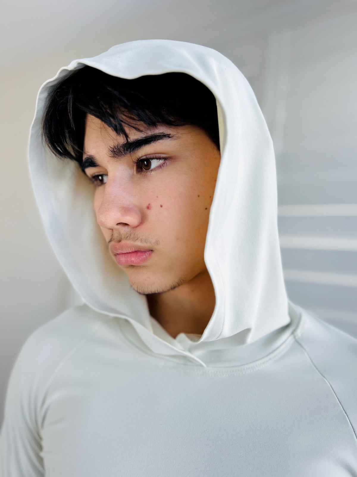BIKINMOR Raglan Long Sleeve Hoodie in Recycled Reactivate Ivory — close portrait