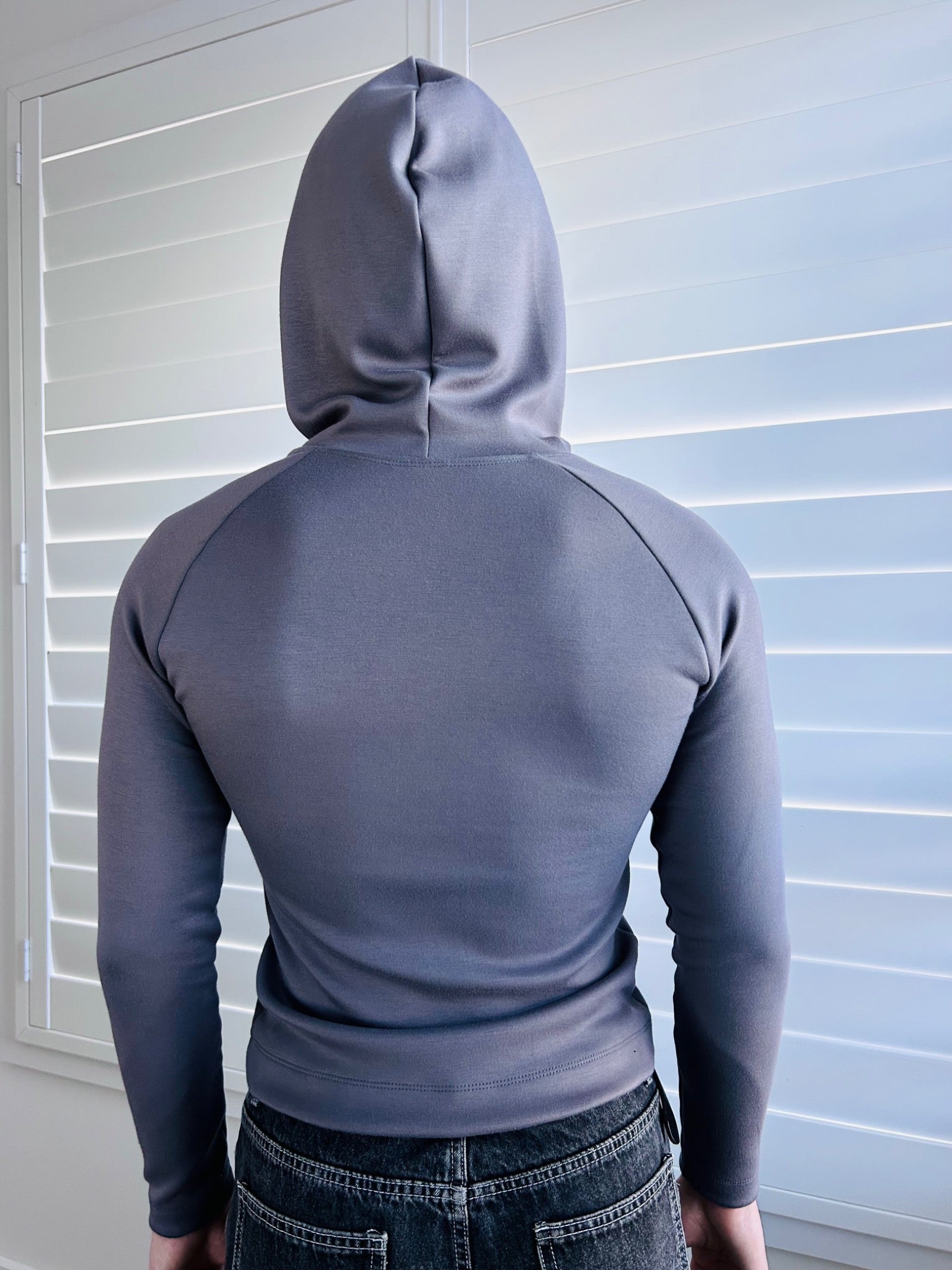 BIKINMOR Slim Fit Hoodie in Ecovero Cozy Stone Grey, back view with hood up