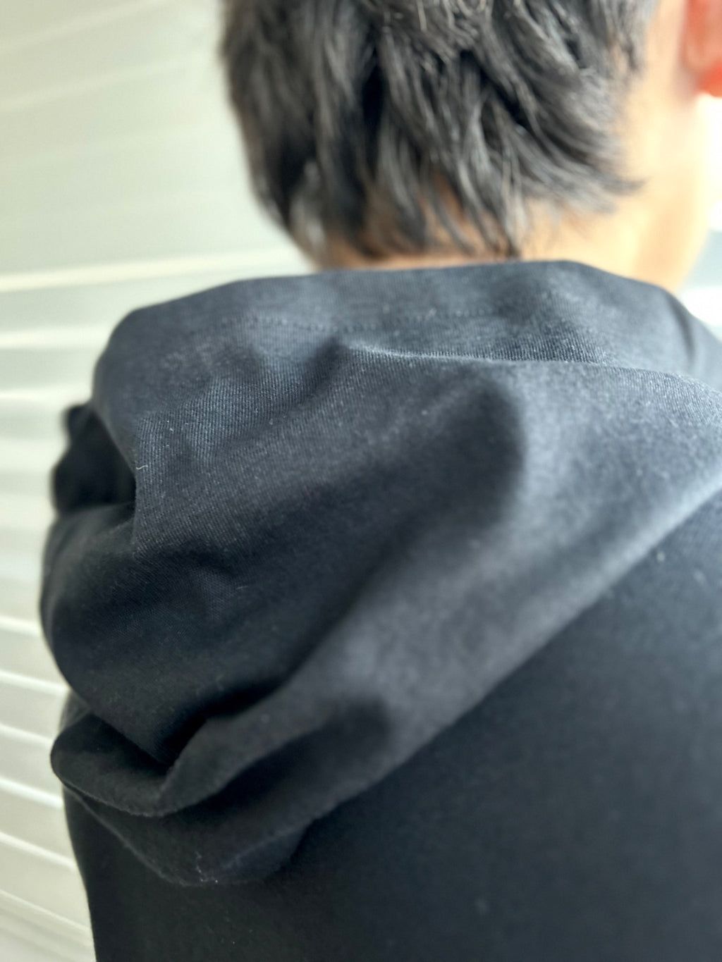 BIKINMOR Slim Fit Long Sleeve Hoodie in Santa Fe Black, size XS, hood construction detail