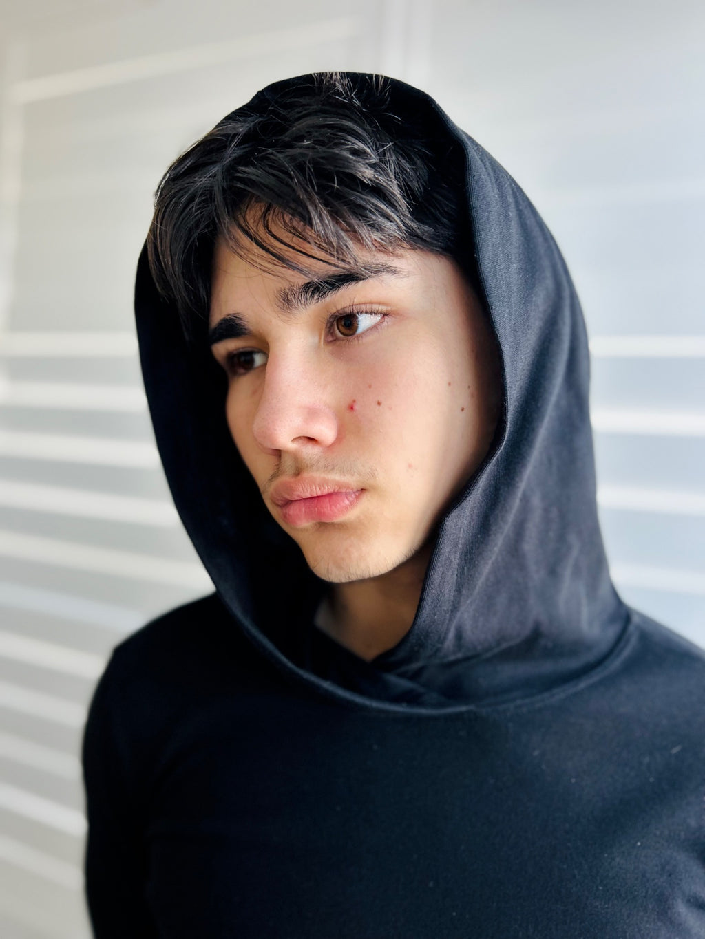 BIKINMOR Slim Fit Long Sleeve Hoodie in Santa Fe Black, size XS, hood up close-up