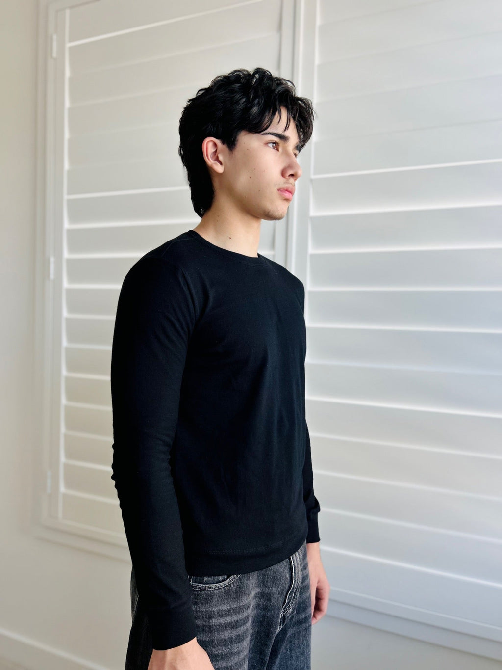 BIKINMOR Slim Fit Long Sleeve T-Shirt — Black, three-quarter view